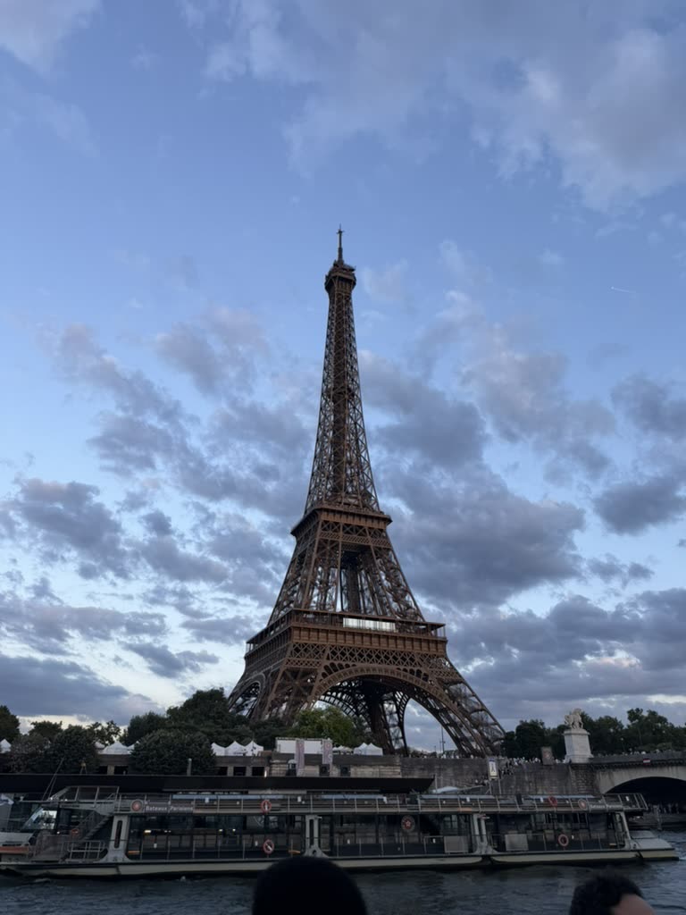 The Eiffel Tower seen from the Seine, from the deck of a river boat